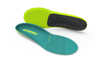 Two pairs of Superfeet insoles, one green and one teal, on a white background.