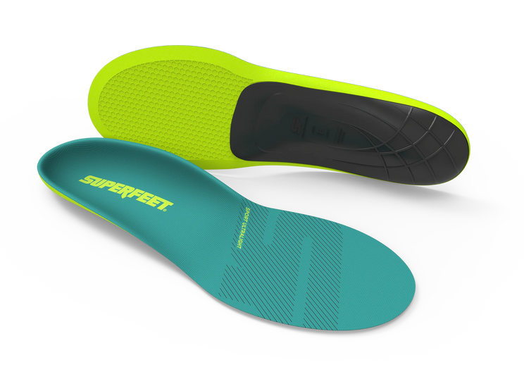 Two pairs of Superfeet insoles, one green and one teal, on a white background.