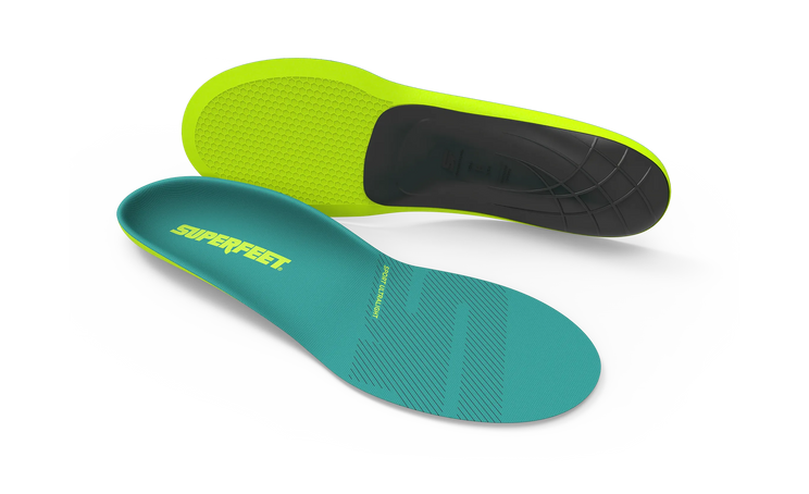 Two pairs of Superfeet insoles, one green and one teal, on a white background.