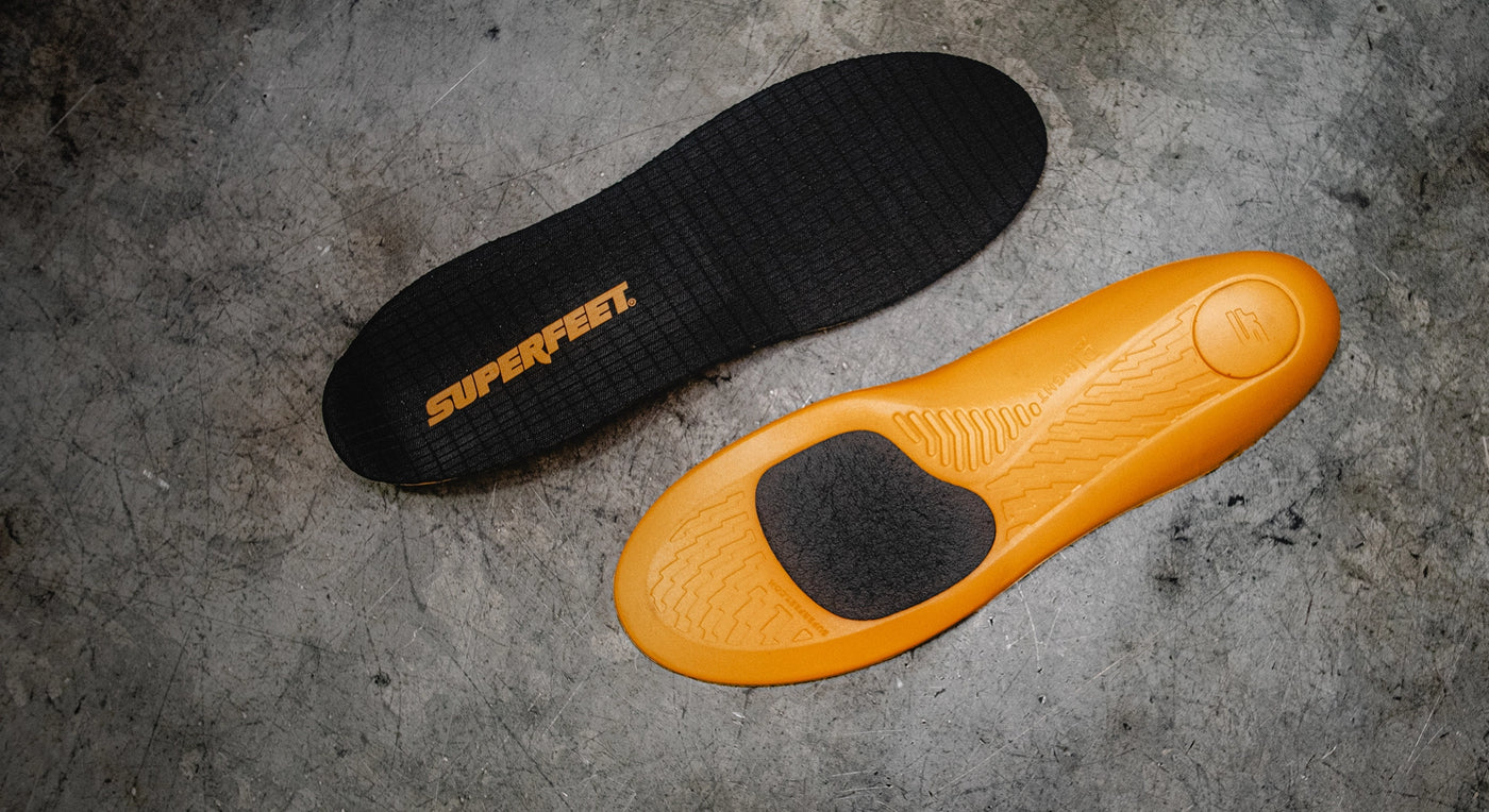 Superfeet's Work ESD Insole laying against a gray background. 