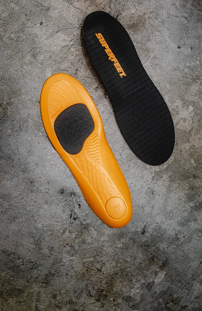 Superfeet's Work ESD Insole laying against a gray background. 