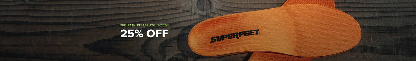 Superfeet insoles on a wooden surface with promotional text for a 25% off sale.