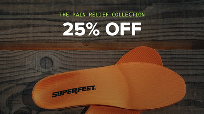 Superfeet insoles on a wooden surface with promotional text for a 25% off sale.