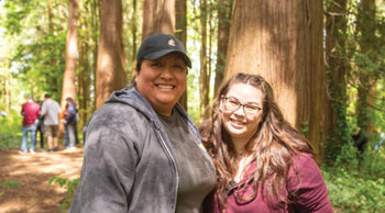 Two Superfeet employees volunteering at local park