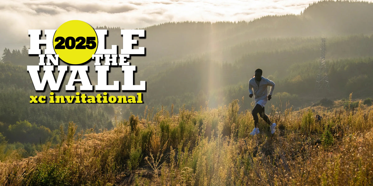 Person running on a trail with 'Hole in the Wall xc invitational 2025' text overlay.