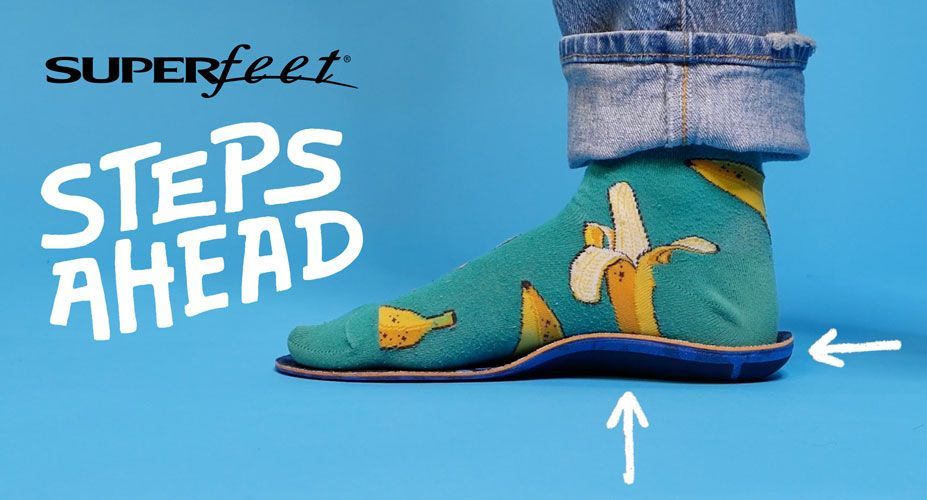 Superfeet Steps Ahead logo with a foot stepping on a Superfeet insole.