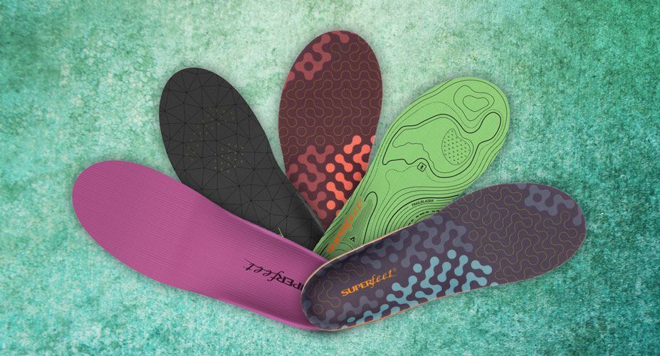 Five Superfeet insoles displayed fanned out